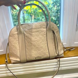 White leather Coach bag.